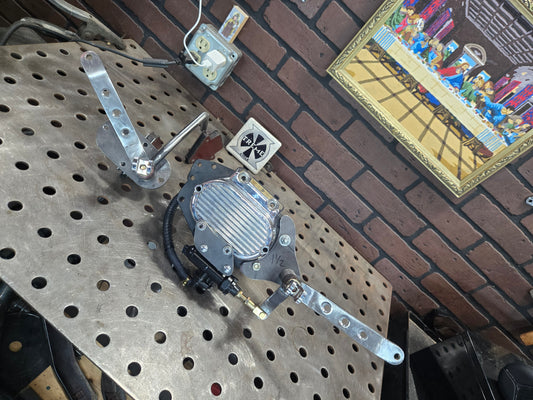 Raw steel mid controls for all 5 and 6 speed big twins with oval inspection cover.