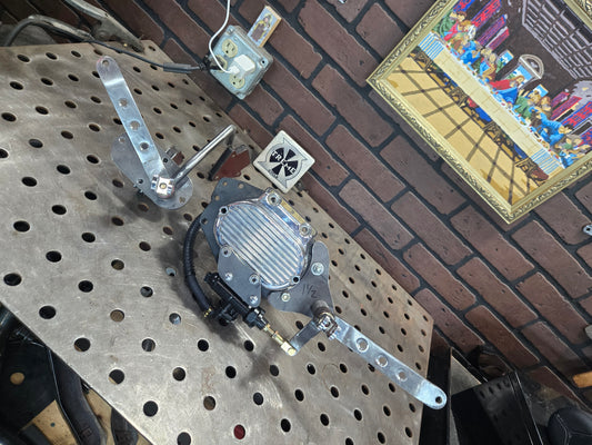 Raw steel mid controls for all 5 and 6 speed big twins with oval inspection cover.